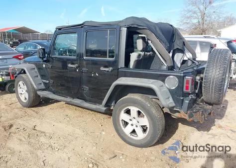 2007 Jeep Wrangler Unlimited Sahara z USA, uszkodzony, nr VIN 1J8GA59147L214088